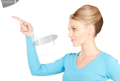 Image of businesswoman pointing her finger