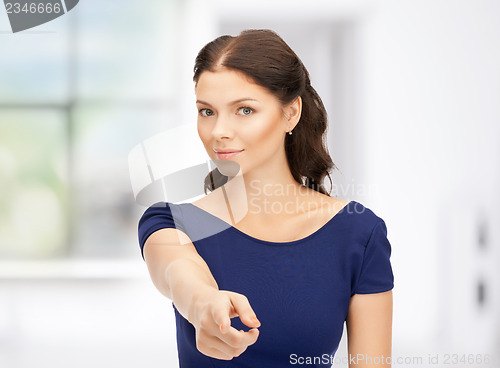 Image of businesswoman pointing her finger