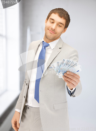 Image of man with euro cash money