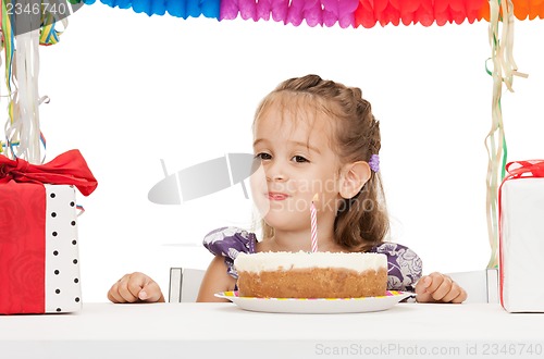 Image of litle girl with birthday cake