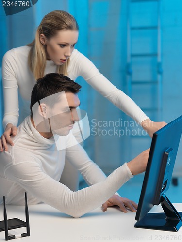 Image of man and woman in laboratory