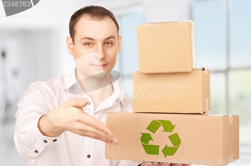 Image of businessman with parcels