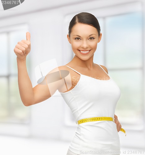 Image of woman with measuring tape