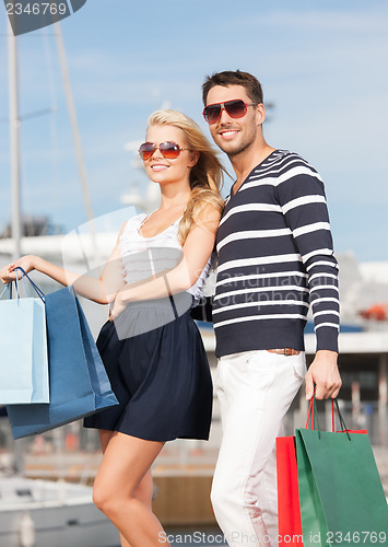 Image of young couple in duty free shop