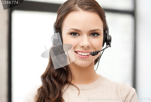 Image of friendly female helpline operator