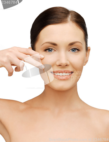 Image of face and hands of beautiful woman