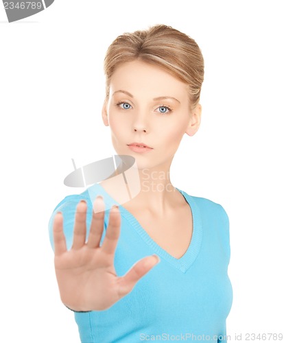 Image of woman making stop gesture