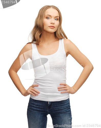 Image of calm and serious woman in blank white t-shirt