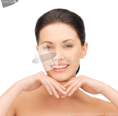 Image of face and hands of beautiful woman