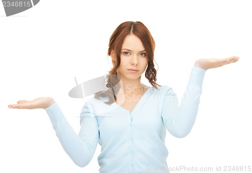 Image of measuring something on the palms of her hands