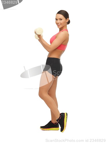 Image of woman with dumbbells