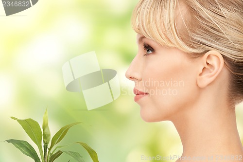 Image of woman with sprout