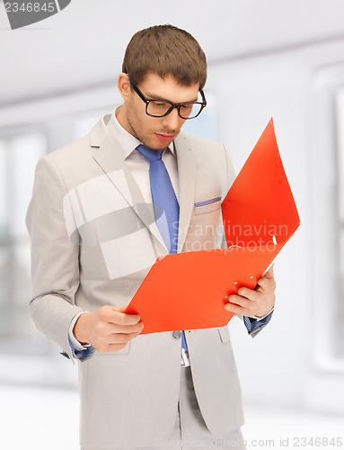 Image of man with folders