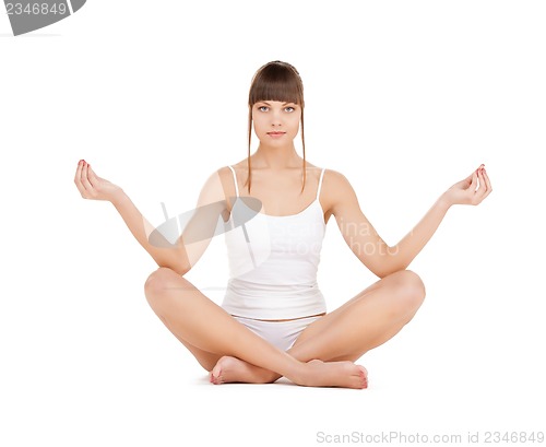 Image of woman practicing yoga