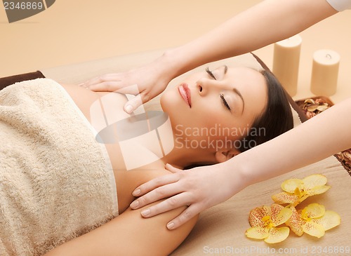 Image of beautiful woman in massage salon