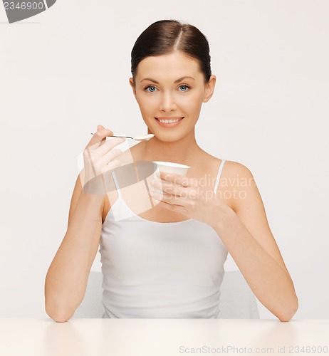 Image of woman with yogurt