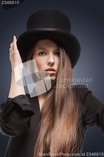 Image of woman in top hat