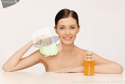 Image of woman with sponge