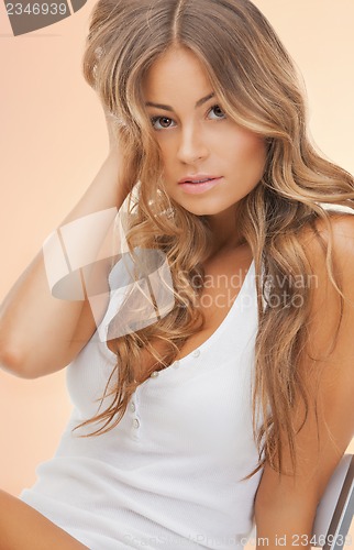 Image of beautiful woman in casual clothes