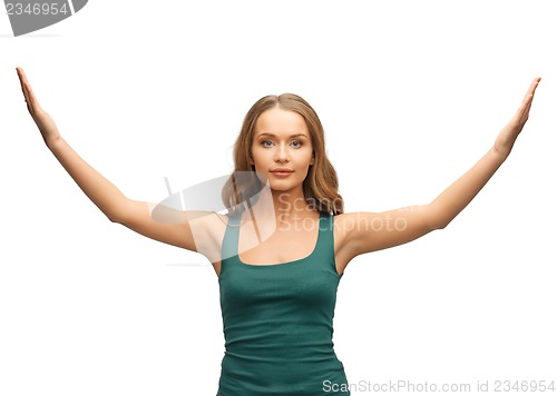 Image of woman spreading hands