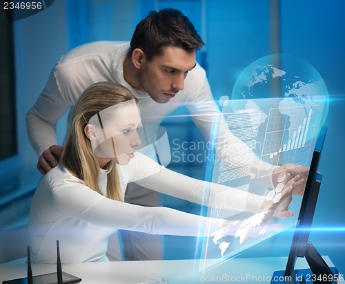 Image of man and woman in laboratory