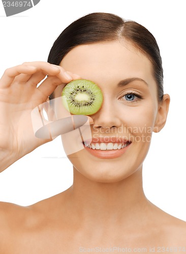 Image of woman with kiwi slice