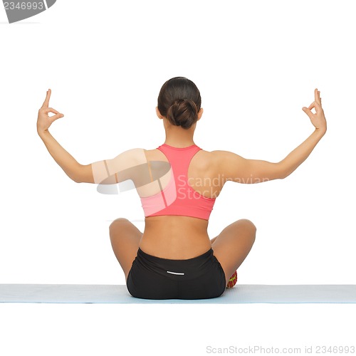 Image of sporty woman doing exercise