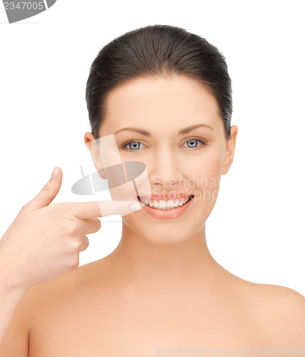 Image of woman showing her teeth