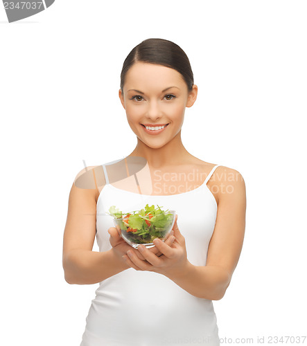 Image of healthy woman holding bowl with salad