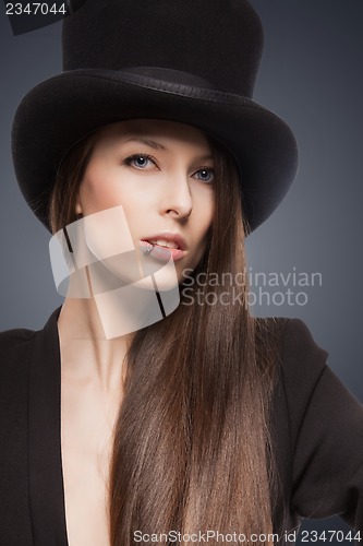 Image of woman in top hat