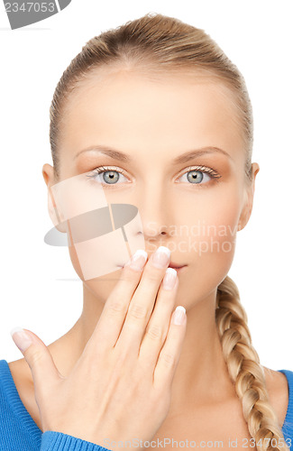 Image of woman with hand over mouth