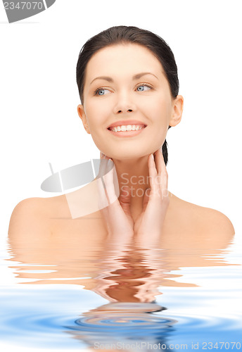 Image of face and hands of beautiful woman