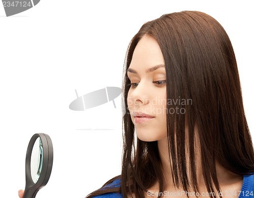 Image of woman with magnifying glass