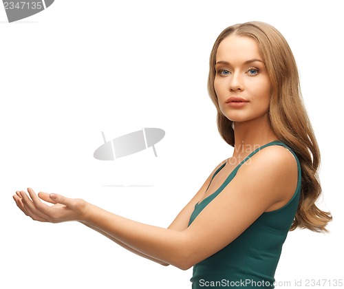 Image of woman holding something on the palms