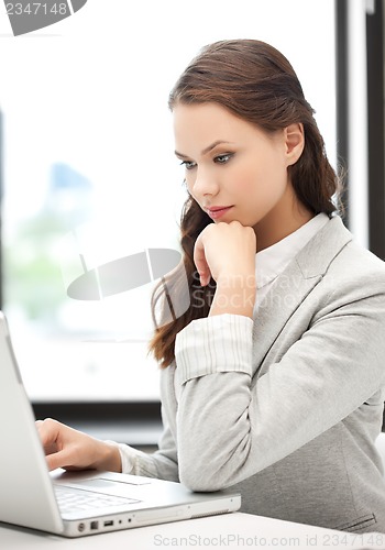 Image of businesswoman with laptop