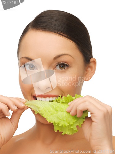 Image of woman with lettuce