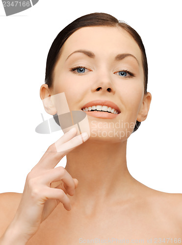 Image of face and hands of beautiful woman