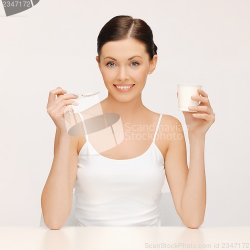 Image of woman with yogurt