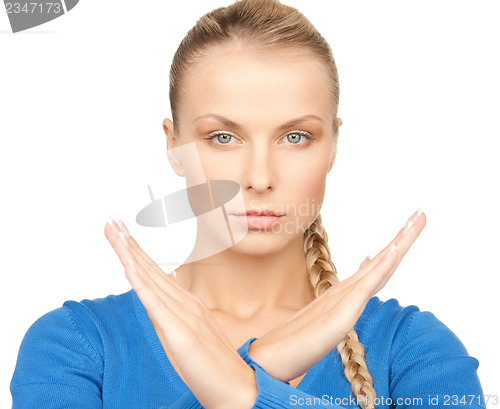 Image of woman making stop gesture