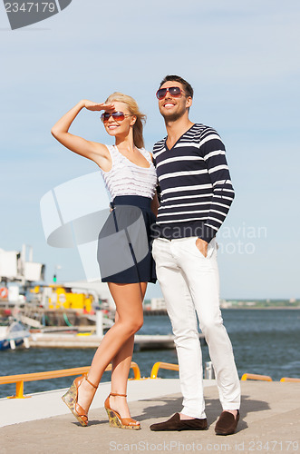 Image of happy young couple in port