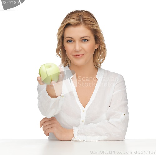 Image of woman with green apple