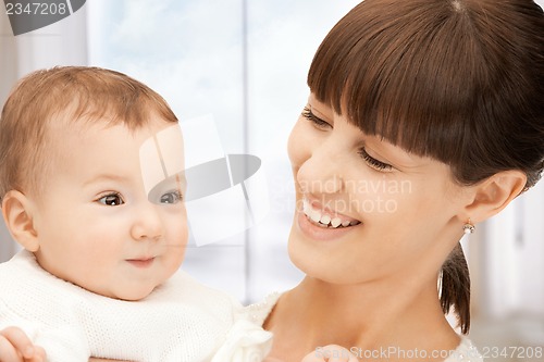 Image of happy mother with adorable baby