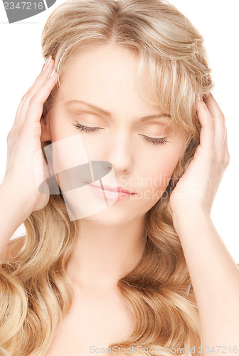 Image of worried woman with long hair