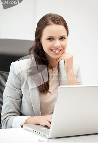 Image of businesswoman with laptop