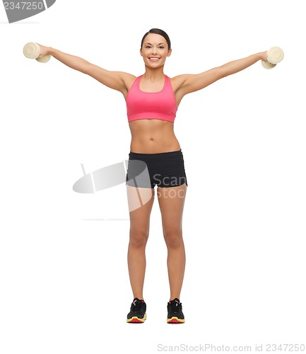 Image of woman with dumbbells