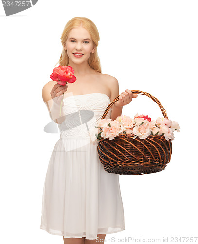 Image of woman with basket full of flowers