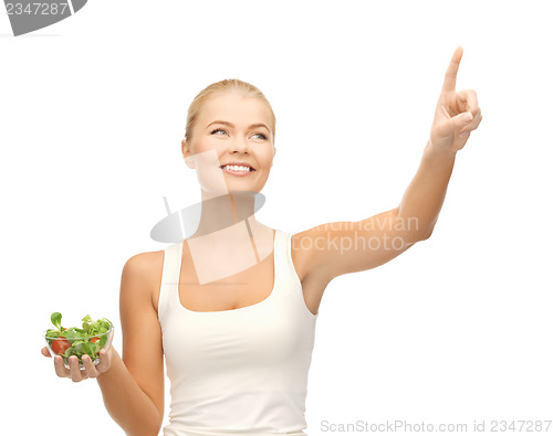 Image of healthy woman holding bowl with salad