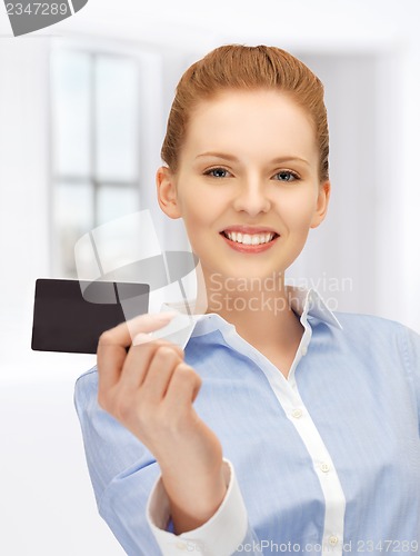 Image of happy woman with credit card