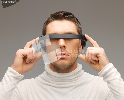 Image of man with futuristic glasses