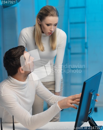 Image of man and woman in laboratory